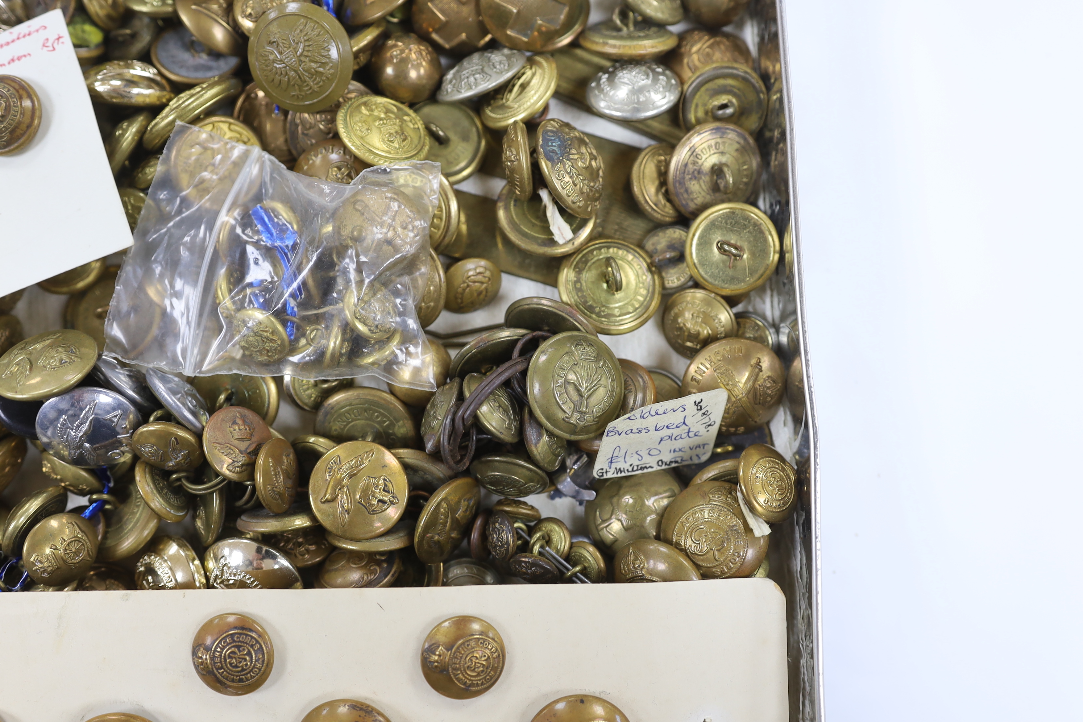 A collection of military buttons, examples including; Royal Fusiliers, Royal Navy, Royal Artillery, RASC, RAMC, RAF, etc. and a few cloth titles, etc.